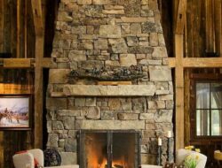Rustic Living Room With Stone Fireplace
